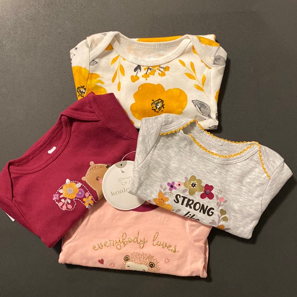 New 4-piece baby girl set. 3-6 mo.